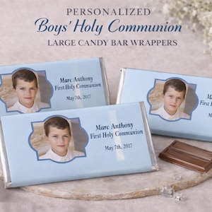 May include: Light blue candy bar wrappers with a photo of a boy, personalized with the text "Marc Anthony, First Holy Communion, May 7th, 2017." The wrappers are labeled "Personalized Boys' Holy Communion, Large Candy Bar Wrappers."