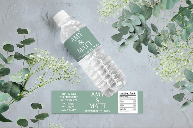May include: A clear plastic water bottle with a green label that reads "AMY & MATT SEPTEMBER 20, 20XX". The image also includes a matching label with the text "THANK YOU FOR BEING HERE TO CELEBRATE WITH US WITH LOVE AMY & MATT".