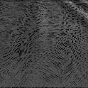 Op de afbeelding: Close-up van een donkergrijze, textuurrijke stof met een subtiel patroon van kleine, verhoogde stippen.