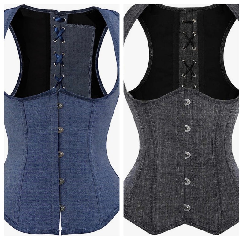 May include: Two denim corsets with a black lining. One corset is blue and the other is gray. Both corsets have a lace-up back and a button-up front.