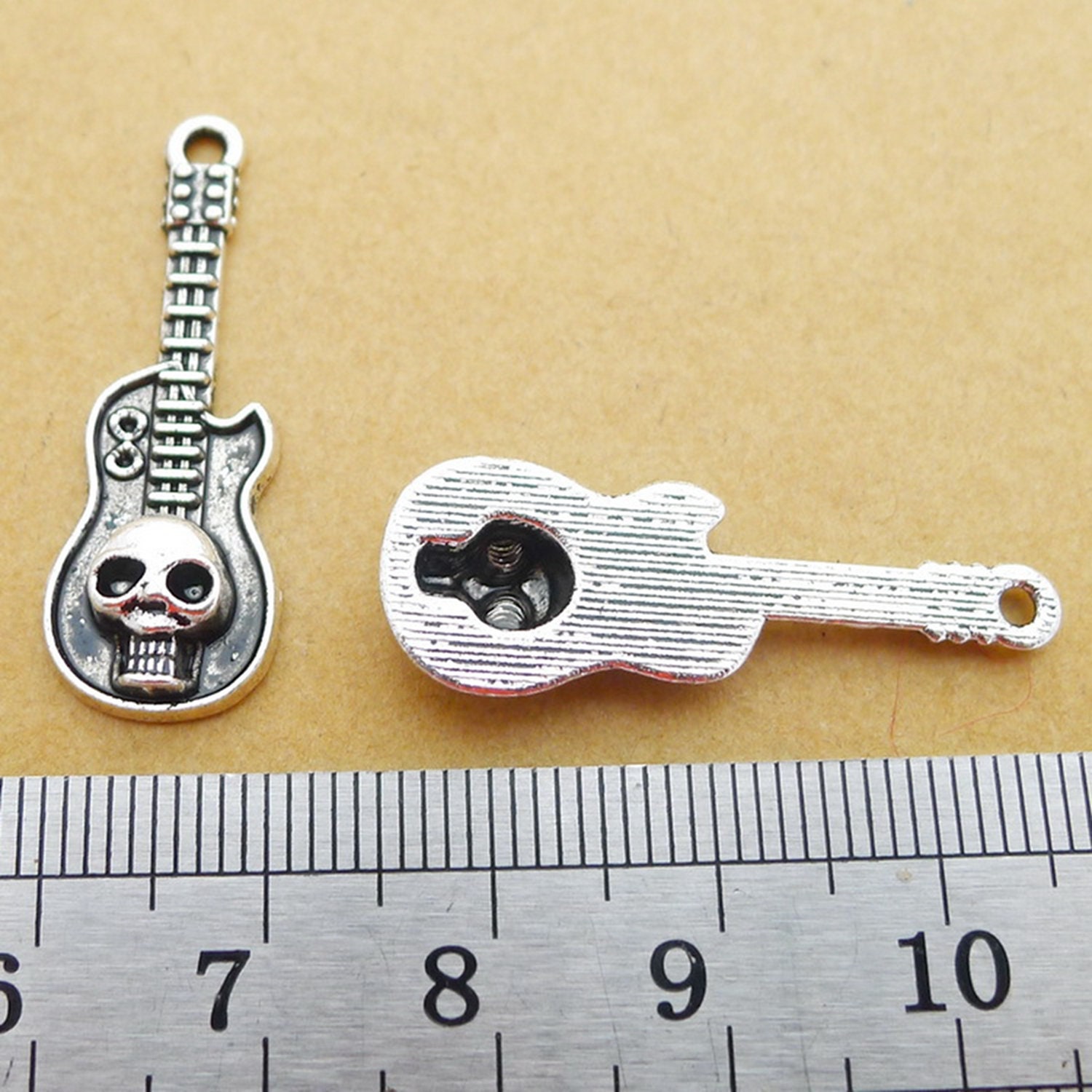 15 or 40PCS, Antique Silver Tone GUITAR With Skull Charm Pendant, Skeleton Head,musician Charms, Musical Charms 11x32mm, JHS821-LY715 - Etsy 15 or 40PCS, Antique Silver Tone GUITAR With Skull Charm Pendant, Skeleton Head,musician Charms, Musical Charms 11x32mm, JHS821-LY715 - Etsy