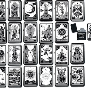 May include: A set of 22 black and white tarot cards featuring illustrations of various figures and symbols. The cards are arranged in a grid pattern and are displayed against a white background. The cards are designed to be used for divination and fortune telling.