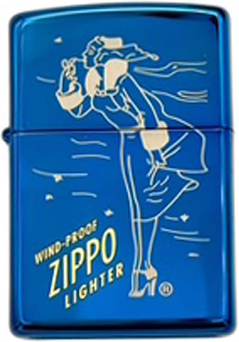 May include: Blue Zippo windproof lighter with a white outline illustration of a woman in a long coat and heels. The lighter has the words "WIND-PROOF ZIPPO LIGHTER" in a stylized font.