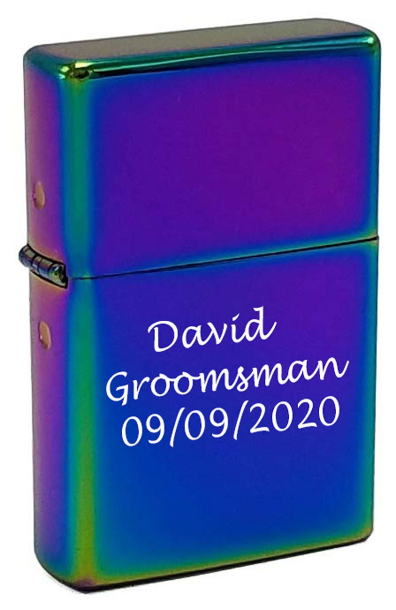 May include: A rainbow-colored lighter with the text "David Groomman 09/09/2020" engraved on the front.