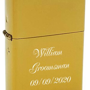 May include: Gold lighter with the inscription "William  Groomsman 09/09/2020" engraved on the front.