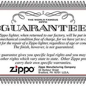 May include: A rectangular white and red Zippo guarantee card with decorative borders. The text reads "GUARANTEE" and details the Zippo lighter repair policy. Includes the Zippo logo and company address in Bradford, PA.