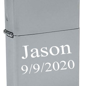 May include: Silver lighter with the name "Jason" and the date "9/9/2020" engraved on it.