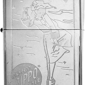 May include: A silver Zippo lighter with an engraved design of a woman in a flowing dress, smoking a cigarette. The lighter has the words "Wind-Proof Zippo Lighter" in a circular emblem.