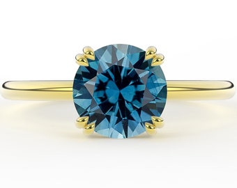 Claw Prong Set Teal Montana Sapphire 1.50 Carat Round Brilliant Minimal Classic Solitaire