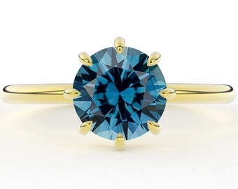 Eight Claw Prong Set Teal Montana Sapphire 1.50 Carat Round Brilliant Minimal Classic Solitaire