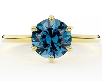 Six Claw Prong Set Teal Montana Sapphire 1.50 Carat Round Brilliant Minimal Classic Solitaire