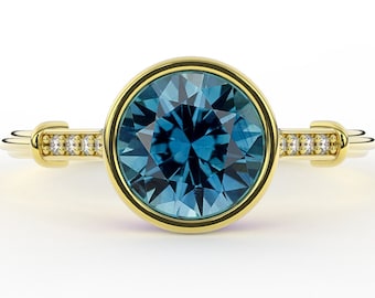 Art Deco Vintage Bezel Set Teal Montana Sapphire 1.50 Carat Round Brilliant & Diamond Side Stone Low Profile Engagement Ring