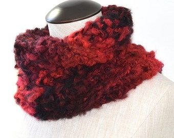 Pip - This snood with multiple shades of red is perfect for the winter season. One size fits all
