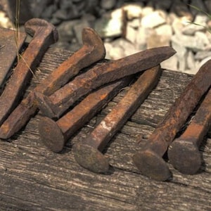 1 Rail road spike, rusted and authentic, pick up right in city of Buffalo NY, great for crafts, Spiritual community, and artists alike!