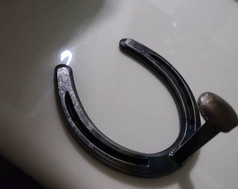 Handcrafted Horseshoe Hook with Railroad Spike: Rustic Home Decor
