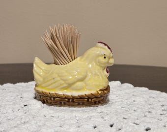 Vintage yellow ceramic hen on nest toothpick holder, made in Japan.