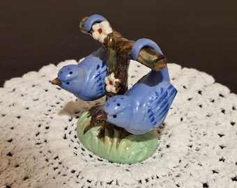 Ceramic Blue Bird Salt and Pepper Shakers Hanging from a Branch.