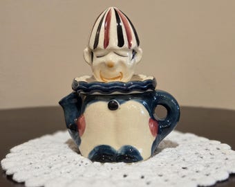 Vintage Ceramic Clown Juice Reamer and Pitcher with Hand-Painted Details.