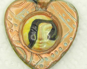 Heart shape with goddess face in copper, white, black, lightweight, handmade with polymer clay P292