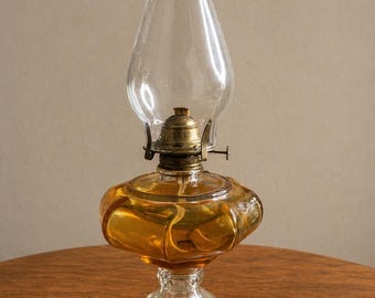 Vintage Amber Glass Oil Lamp with Clear Pedestal Base