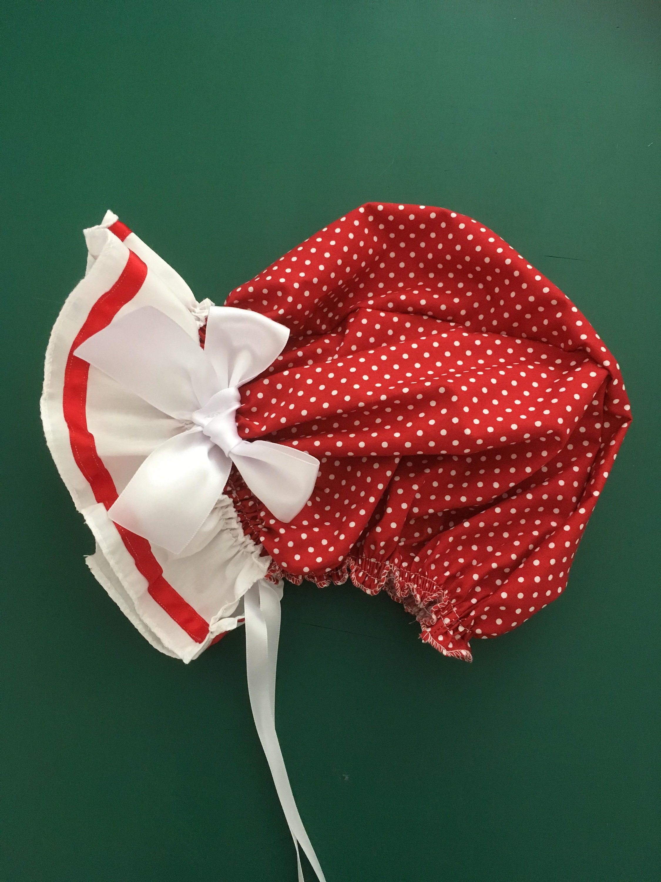 red baby bonnet