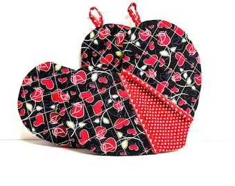 Pick any pair of; Heart-shaped potholder; Romantic kitchen accessories; Handmade Valentine's gifts; Love-themed potholders;