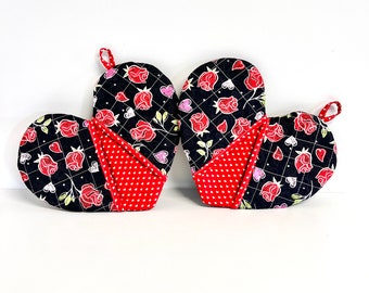 Pick any pair of; Heart-shaped potholder; Romantic kitchen accessories; Handmade Valentine's gifts; Love-themed potholders;