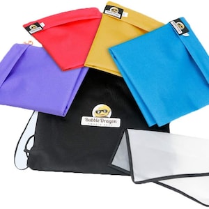May include: A set of five small drawstring bags in various colors, including purple, red, yellow, blue, and black. The bags are made of a soft, durable fabric and feature a small logo with a cartoon character wearing sunglasses. The bags are ideal for storing small items, such as jewelry, cosmetics, or electronics.