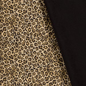 Softshelltyg med pantermönster, svart och gult, vatten- och vindtätt