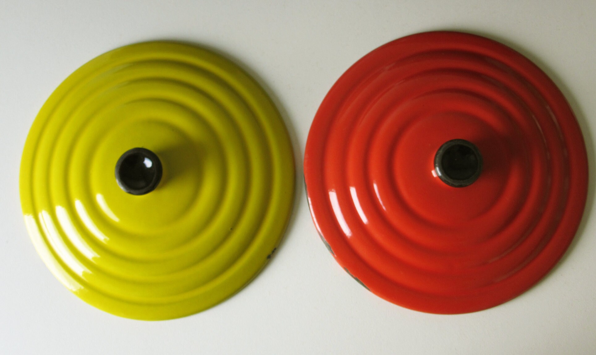 Two Vintage Enamel Fireresistant Dishes Black with Red and Yellow Lid Confetti Design made by DRU Holland 19006