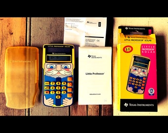 Texas Instruments TI Little Professor Solar math teacher / in original box complete all paperwork / like new condition