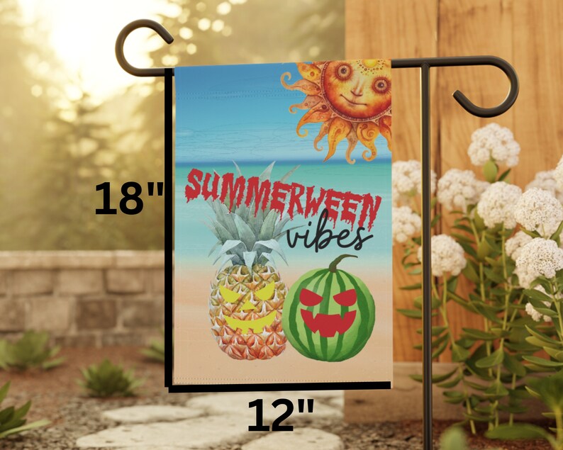 May include: A 12" by 18" garden flag with a summer and Halloween theme. The flag features a pineapple and watermelon with jack-o-lantern faces, a sun with a smiling face, and the text "Summerween vibes".