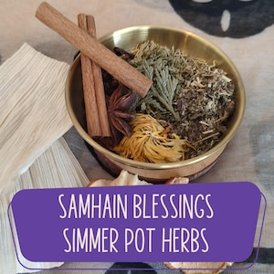 May include: A brass bowl filled with dried herbs, spices, and flowers. Cinnamon sticks, star anise, and dried yellow flowers are visible. The text "SAMHAIN BLESSINGS SIMMER POT HERBS" is displayed on a purple banner.