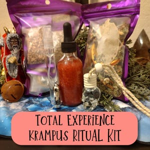 May include: A Krampus ritual kit with a red liquid bottle, a skull-shaped bottle, and two purple bags filled with herbs. The kit includes a spray bottle and a decorative figure of a Krampus. The text "TOTAL EXPERIENCE KRAMPUS RITUAL KIT" is displayed on a pink banner.