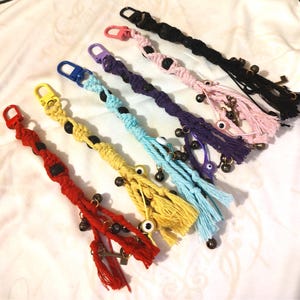 Witch Bell Protection Charm, Handmade Macrame Witch Bells Mini Keychain with Evil Eye Beads and Lava Stone Diffuser Beads for Safe Travels