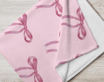Manta de coqueta con lazo rosa