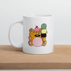 Niedliche Tasse mit Teddybär und Eistüte