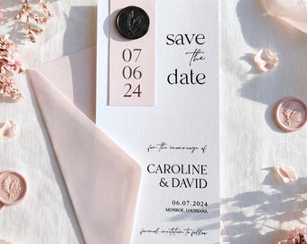 May include: A flat lay featuring a wedding invitation suite. The invitation card reads "Save the date" with the names "CAROLINE & DAVID" and the date "06.07.2024". The suite includes a pink envelope, wax seals, and decorative ribbons and flowers.