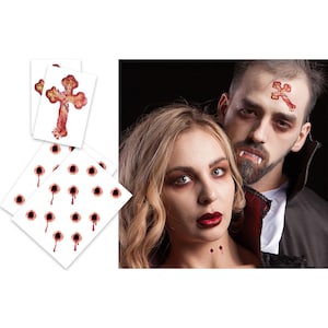 May include: Two sheets of temporary tattoos with a bloody cross and bloody bullet holes. The tattoos are on a white background.