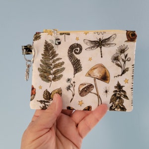 Handmade small coin purse in Jason Yenter&#39;s Sun, Moon, and Stars fabric line, clip on change pouch, zip bag, approximately 6 x 4.5 inches