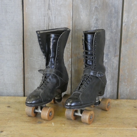 Pair of Antique Leather Boots with Dexter Roller S