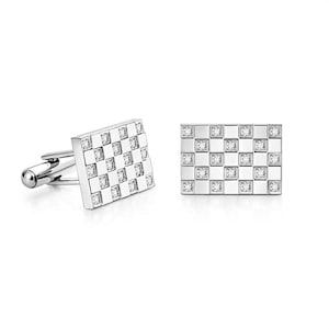 May include: A pair of silver cufflinks with a checkerboard pattern. Each square of the pattern is accented with a small, clear gemstone. The cufflinks have a rectangular shape with a rounded post.