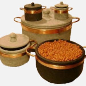 May include: Set of four gray stone cooking pots with copper accents. The pots have lids and are of varying sizes.