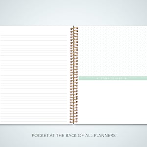 May include: An open spiral bound planner with a white background and lined pages. The left side has a tabbed section with the months of the year labeled in different colors. The right side has a green tab with the text "Stuff to Keep".