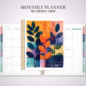 May include: A spiral-bound monthly planner with a cover featuring an abstract painting of three leafy branches in shades of orange, yellow, and dark blue. The cover text reads 2026/2027 PLANNER and JESSICA FRANKLIN. The interior pages show a monthly calendar grid.