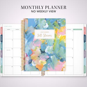 Puede incluir: Una agenda mensual con un dise&ntilde;o abstracto colorido en la portada. La portada presenta un dise&ntilde;o abstracto azul, amarillo, rosa y verde. La agenda se titula "2025 Planner Jill Slocum".