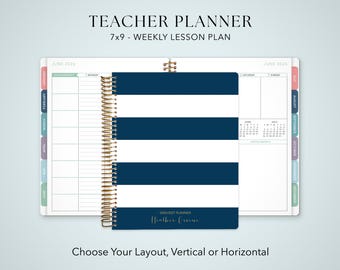 May include: A 7x9 inch teacher planner with a navy blue and white horizontal striped cover, gold spiral binding, and the text 2026/2027 PLANNER Heather Greene. The open planner displays a weekly lesson plan layout with monthly tabs along the side.