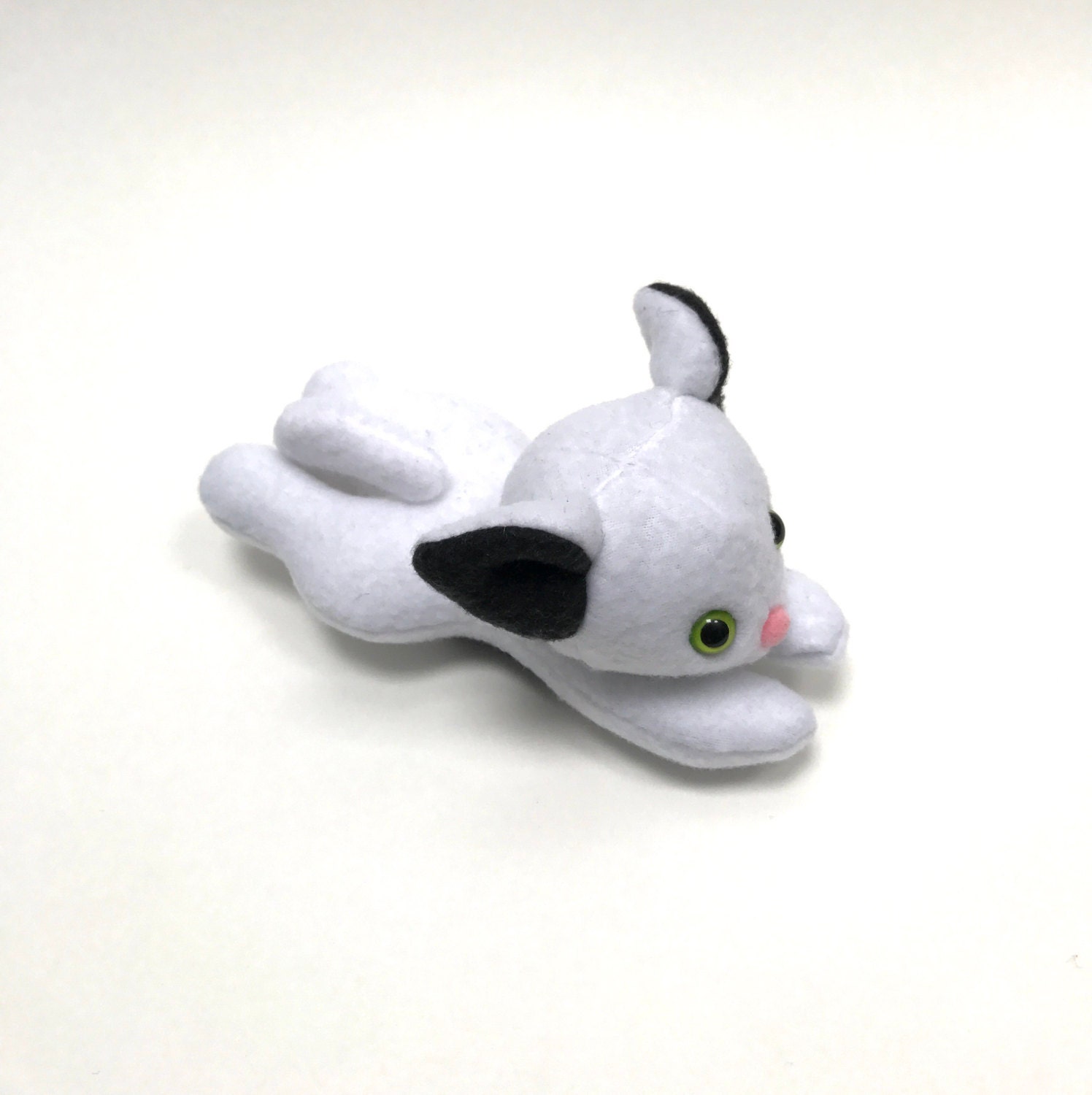 black and white stuffed cat toy