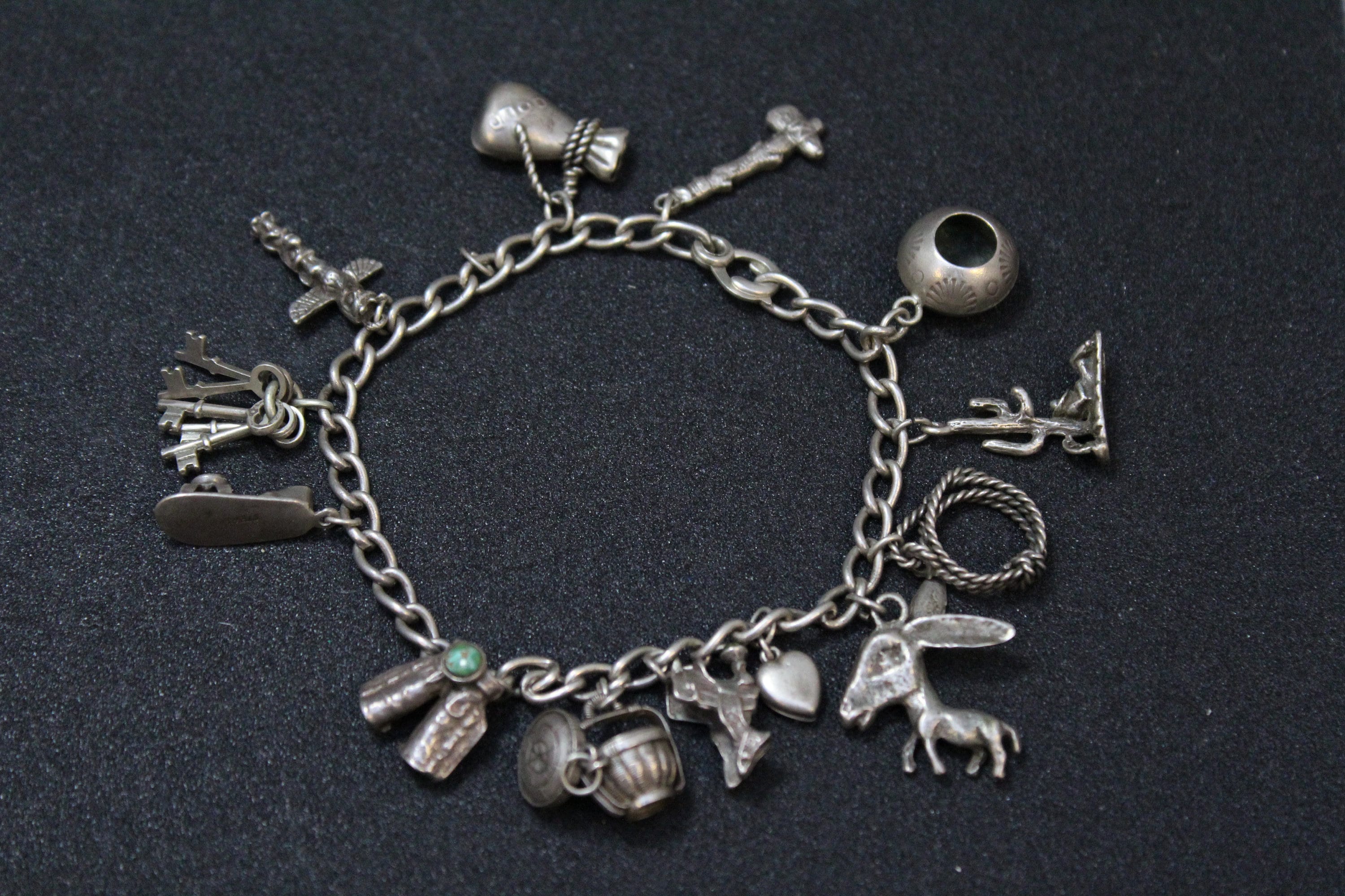 Sterling Silver Charm Bracelet w/15 Sterling Silver Charms – Upscale  Consignment