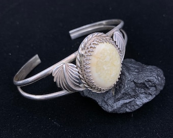 Designer Signed Sterling Silver Cuff Bracelet with Oval White Stone and Leaf Design